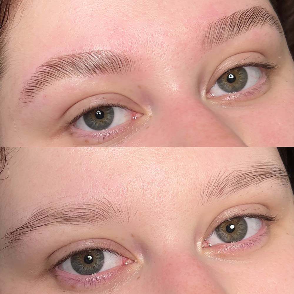Nahaufnahme eines Paares von Augen mit dicht gefüllten, symmetrischen Augenbrauen, neutraler Ausdruck.